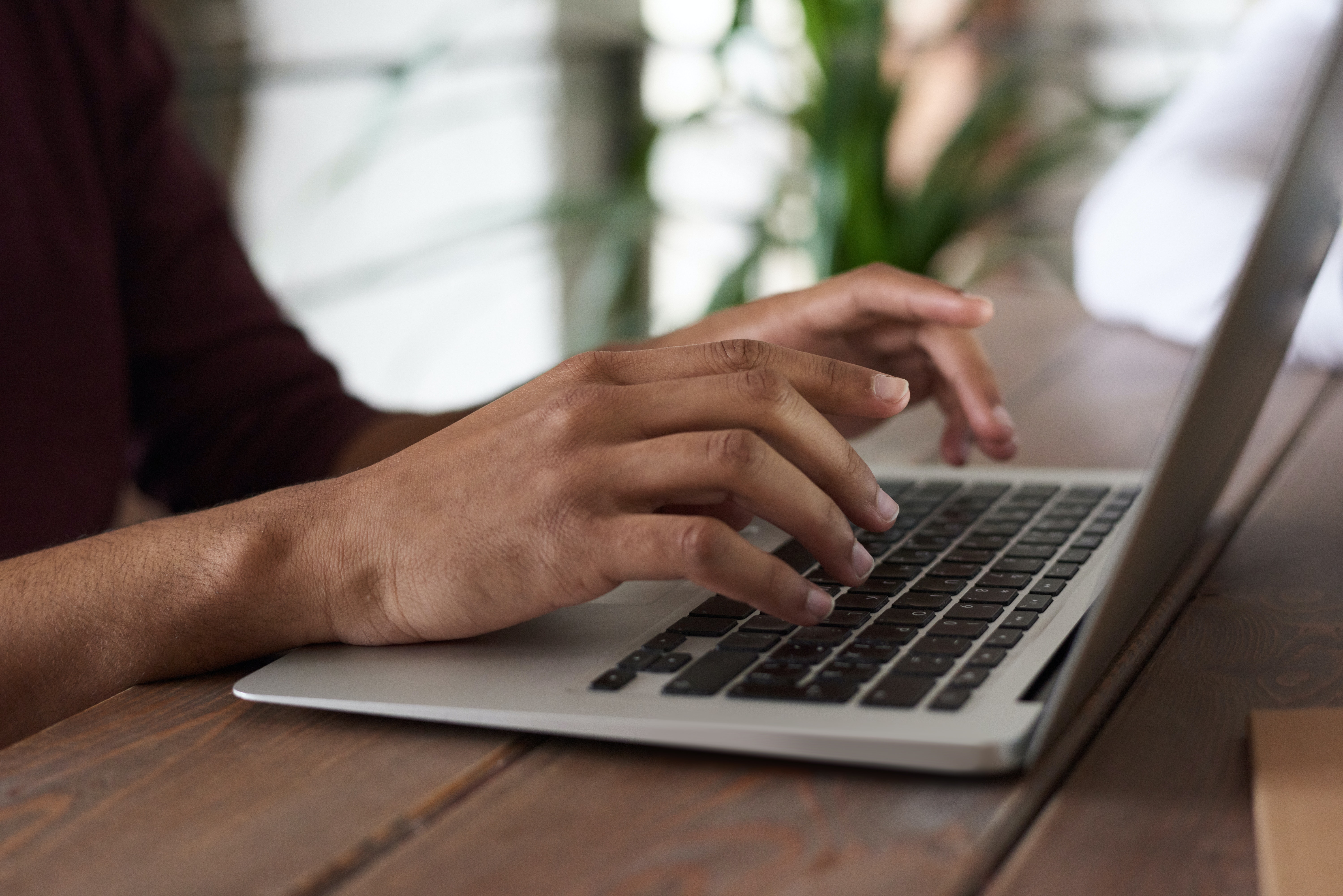 person typing on computer